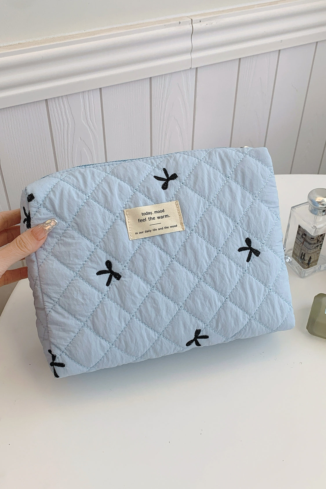 Bow Embroidered Quilted Storage Bag